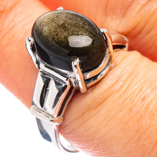 Sterling silver ring with dark oval cabochon and filigree-style bezel, size 8.75