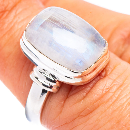 Sterling silver ring with oval moonstone cabochon and polished openwork band