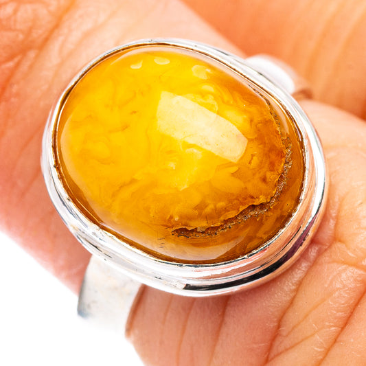 Amber cabochon ring with .925 sterling silver bezel, size 4.75