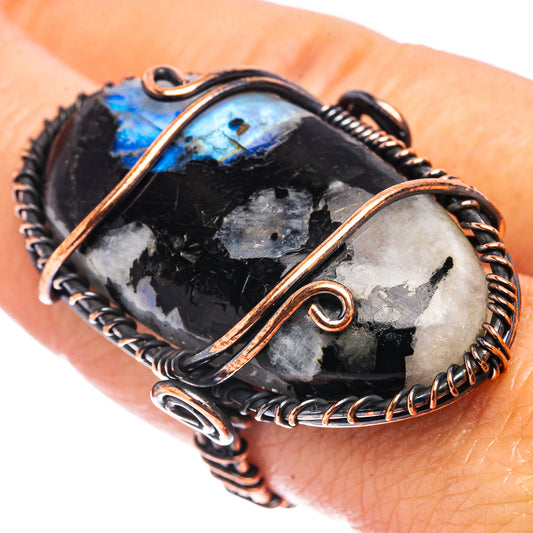 Oxidized copper wire-wrap ring with black tourmaline and iridescent blue moonstone