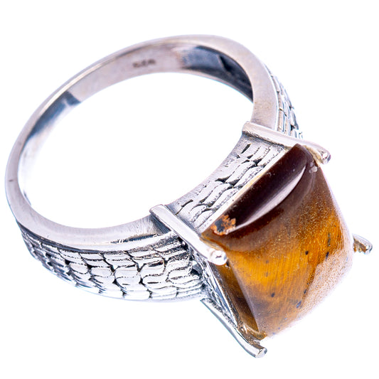 Sterling silver ring with textured filigree shank and tiger’s eye oval stone