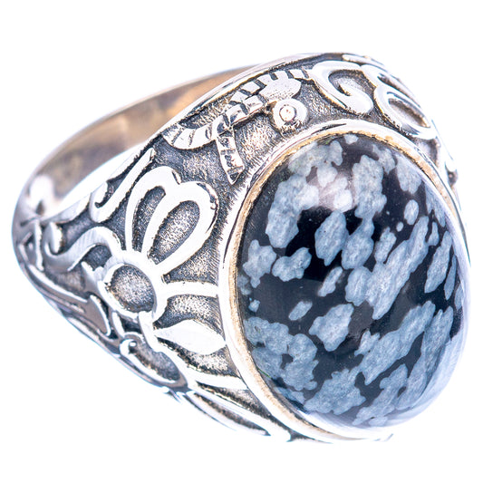 Silver filigree ring with blue druzy oval stone and snowflake-leaf motifs