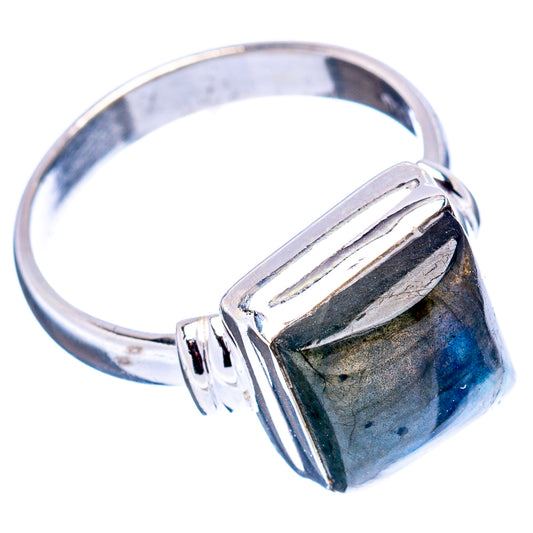 Labradorite ring with faceted blue stone and open metal shoulders, .925 sterling silver