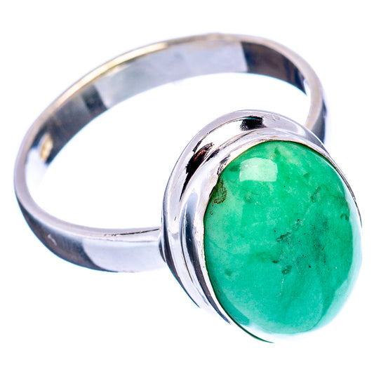 Sterling silver ring with oval green cabochon gemstone, side angle showing band