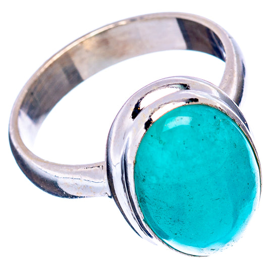 Turquoise oval gemstone sterling silver ring, side view with round bezel setting