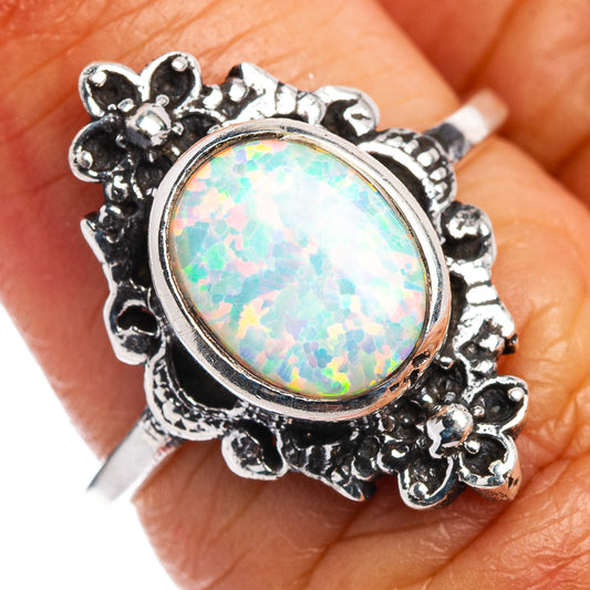 Sterling silver opal dainty ring with oval lab opal cabochon and floral filigree