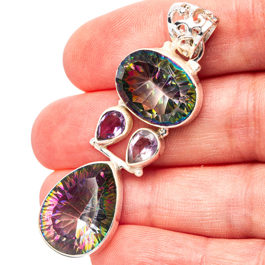 Sterling silver pendant with rainbow mystic topaz and three amethyst accents