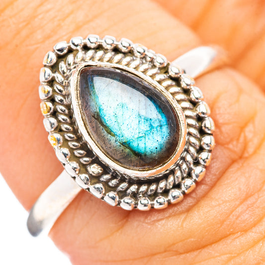 Sterling silver ring with oval labradorite stone in a beaded frame