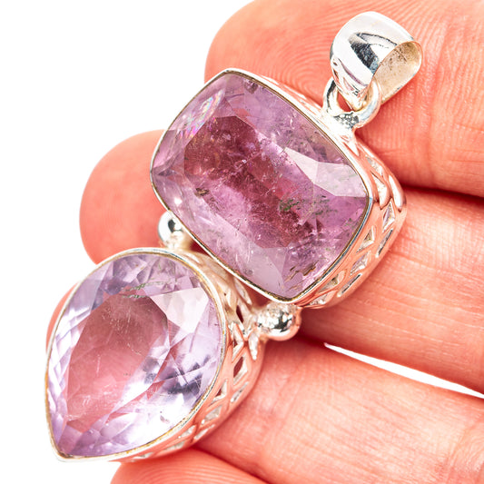 Sterling silver amethyst pendant with two faceted oval purple stones