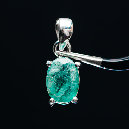 Oval Zambian emerald pendant in .925 sterling silver, bezel-set with loop bail