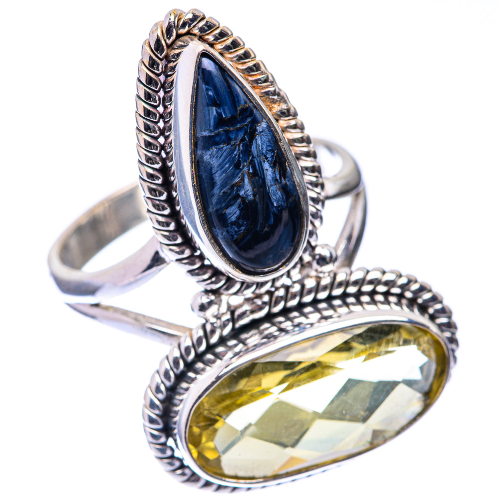 Sterling silver ring with blue marquise and yellow oval quartz, braided rope frame