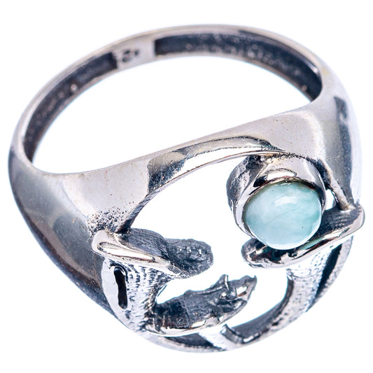 Sterling silver mushroom ring with oval light blue larimar cabochon and sculpted band