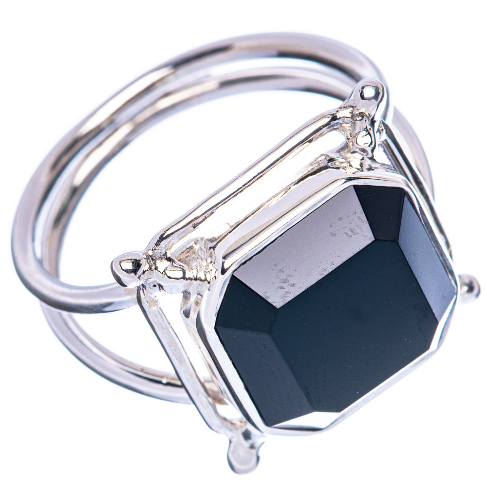 Sterling silver ring with dark octagonal gemstone, open frame and prong details