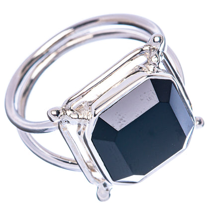 Sterling silver ring with dark octagonal gemstone, open frame and prong details