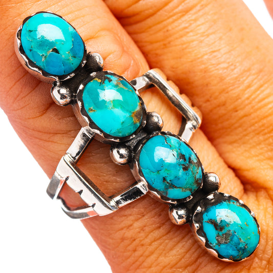 Sterling silver turquoise ring with four oval stones in bezel settings