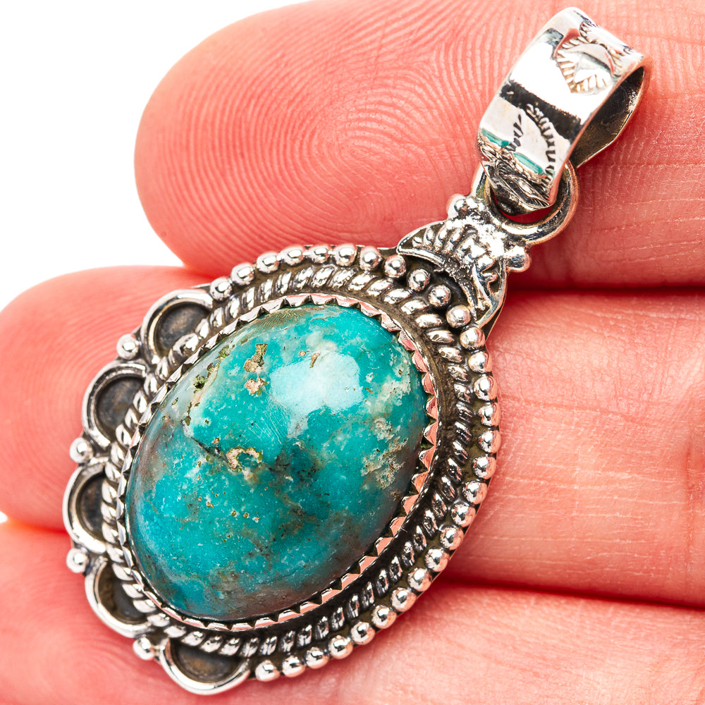 Sterling silver oval turquoise pendant with beaded border and scalloped frame