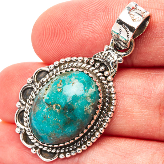 Sterling silver oval turquoise pendant with beaded border and scalloped frame