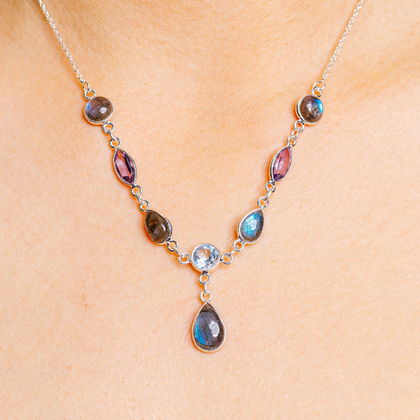 925 sterling silver gemstone necklace with blue, purple, and dark teardrop stones