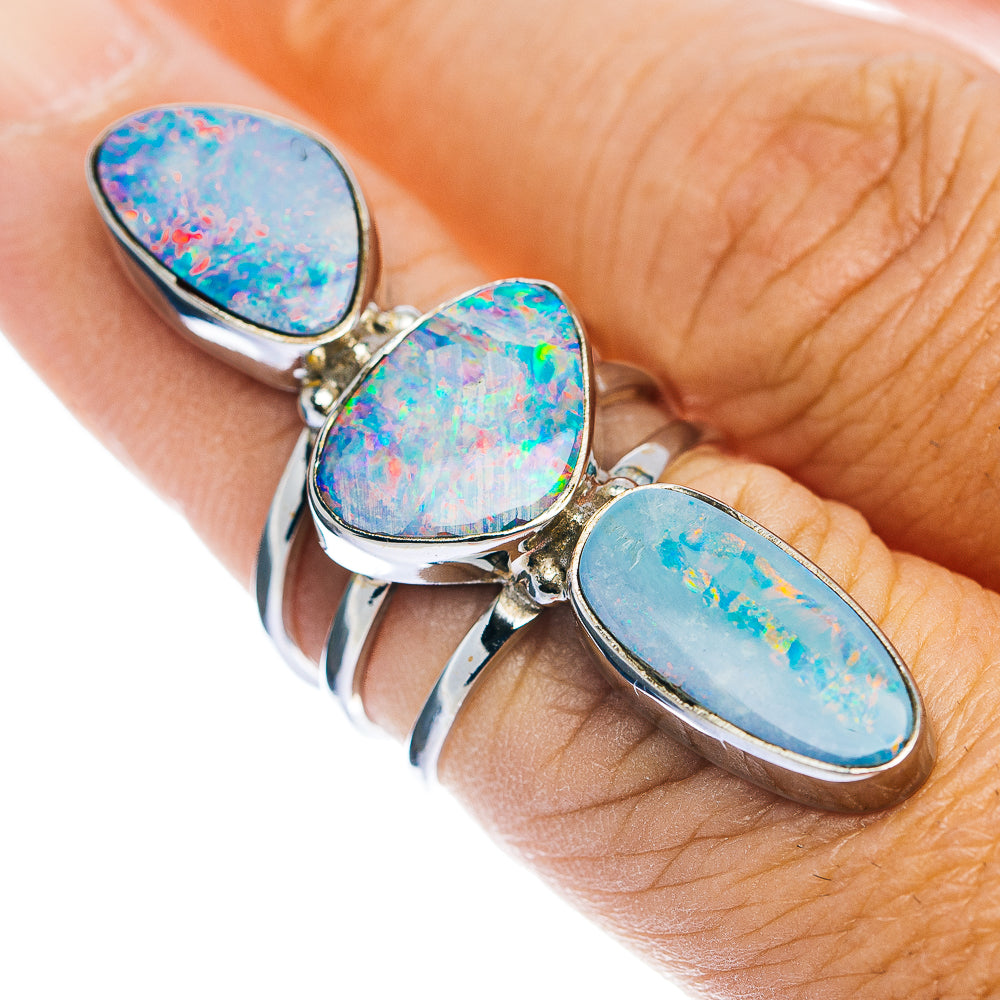 Sterling silver fire opal ring with three oval blue opal cabochons on open band