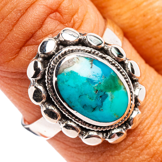 Turquoise oval sterling silver ring with ornate bezel and scalloped edge