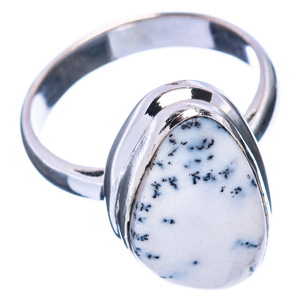 Sterling silver ring featuring an oval white cabochon with dark dendritic pattern