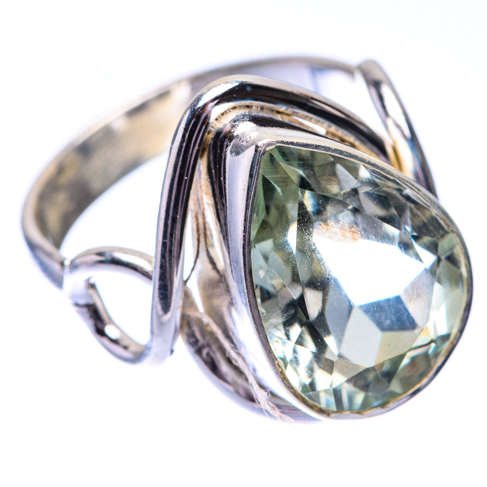 Oval faceted green amethyst in sterling silver ring with decorative shank