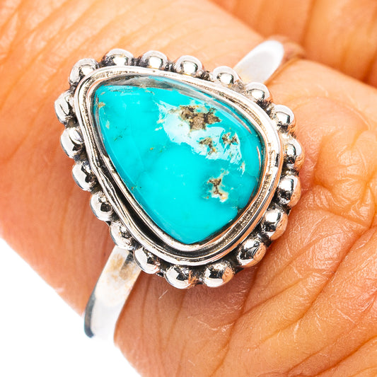 Dainty oval turquoise gemstone ring in .925 sterling silver with scalloped setting