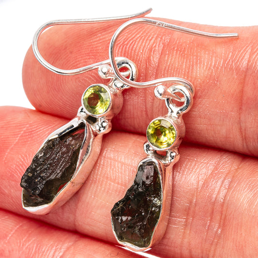 Sterling silver moldavite earrings with green teardrop stones and dark rough drops