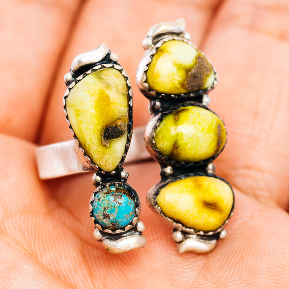 Adjustable .925 sterling silver ring with two oval yellow stones and turquoise drop dangle