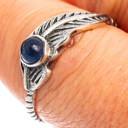Sterling silver feather ring with oval kyanite cabochon, close-up on band