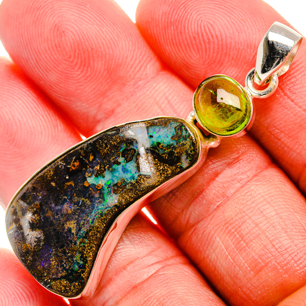 Small opal teardrop pendant with round peridot accent and silver bail