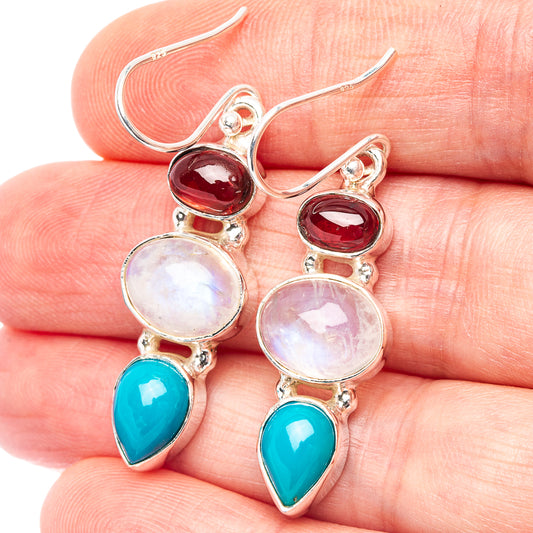 Sterling silver drop earrings with moonstone, red garnet, and blue-green turquoise stones