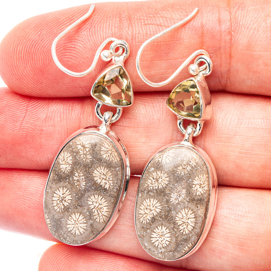 Sterling silver dangle earrings with yellow faceted top and oval fossil coral drop