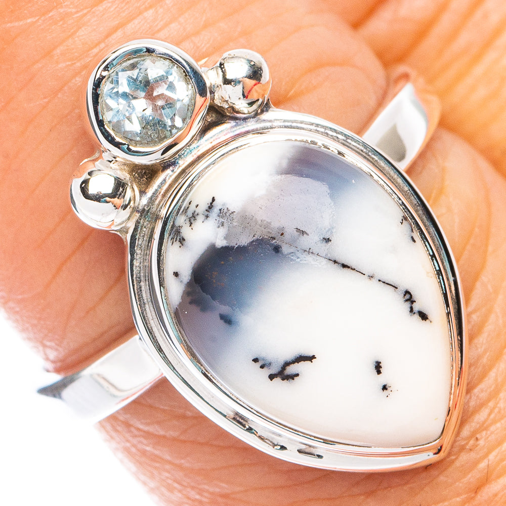 Dendritic opal ring with oval white stone and sterling silver prong setting