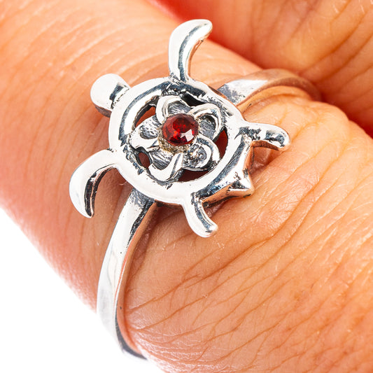 Sterling silver sea turtle ring with red garnet-style gemstone, size 7.75