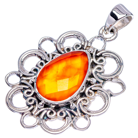 Oval orange carnelian pendant with ornate sterling silver filigree and loop bail