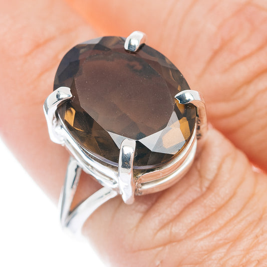 Smoky quartz sterling silver ring with round dark gemstone in four-prong setting