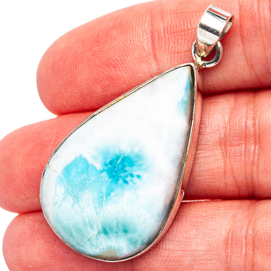 Larimar pendant in teardrop shape, .925 sterling silver bezel and loop bail