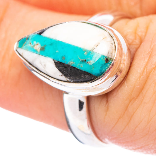 Sterling silver ring with oval turquoise stone and white marbled backing detail