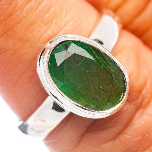 Faceted Zambian emerald ring with oval green gemstone in .925 sterling silver