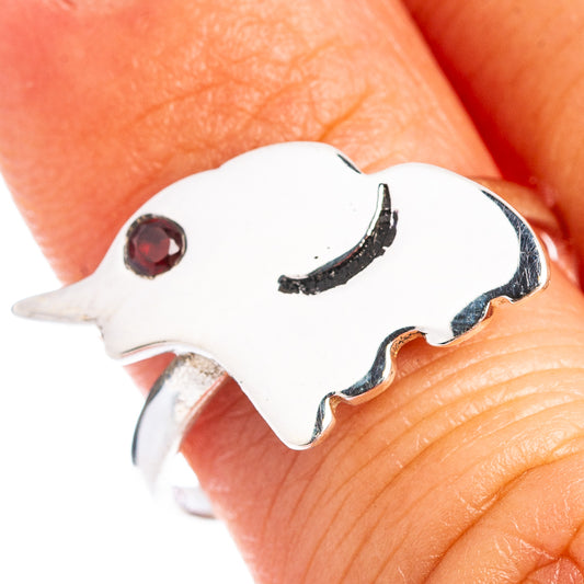 Sterling silver elephant dainty ring with red garnet eye, curved band