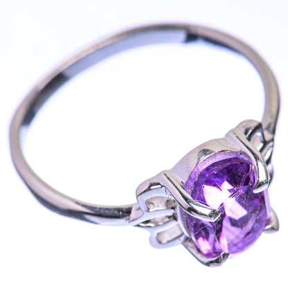 Silver dainty ring with faceted purple amethyst oval and side prong details