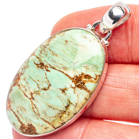 Variscite pendant: oval turquoise variscite with .925 sterling silver bezel and bail