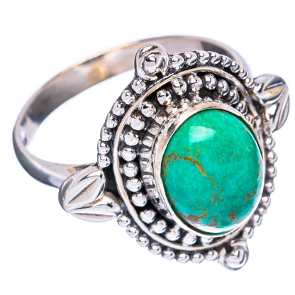 Oval turquoise cabochon ring with 925 sterling silver scrollwork and prong tips