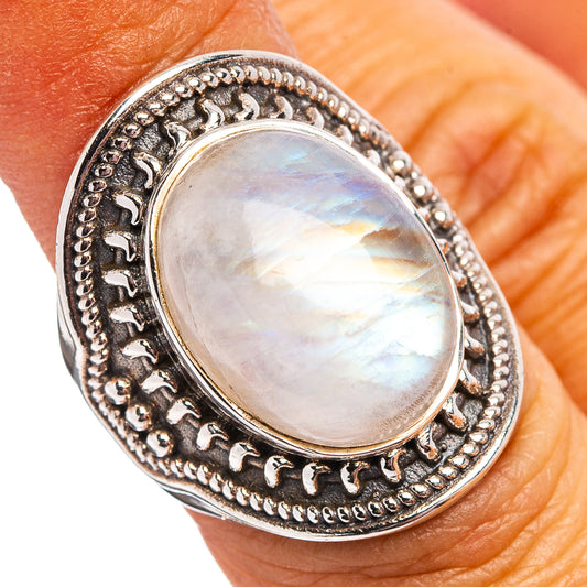 Oval moonstone cabochon ring in .925 sterling silver with ornate beaded border