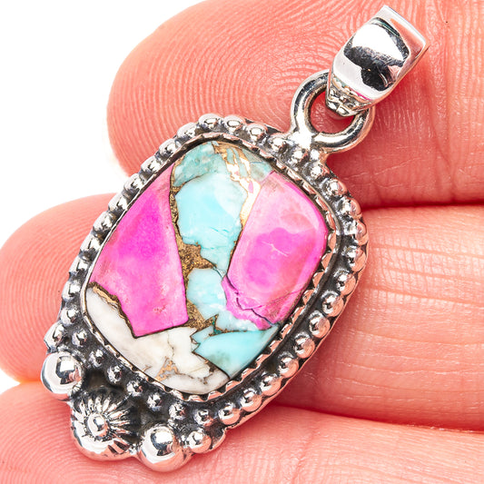 Turquoise and pink stone pendant with ornate sterling silver bezel and bail