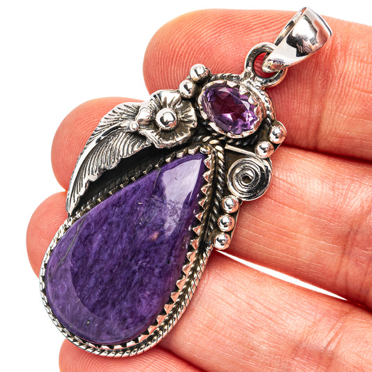Sterling silver teardrop pendant with charoite and amethyst accents
