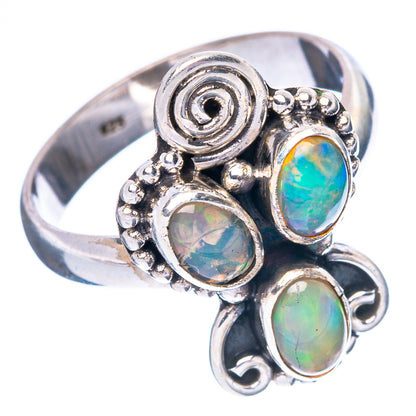 Sterling silver ring with four oval opals in green-blue and decorative round details