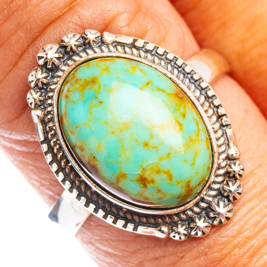 Turquoise oval gemstone ring in sterling silver with star and etched border