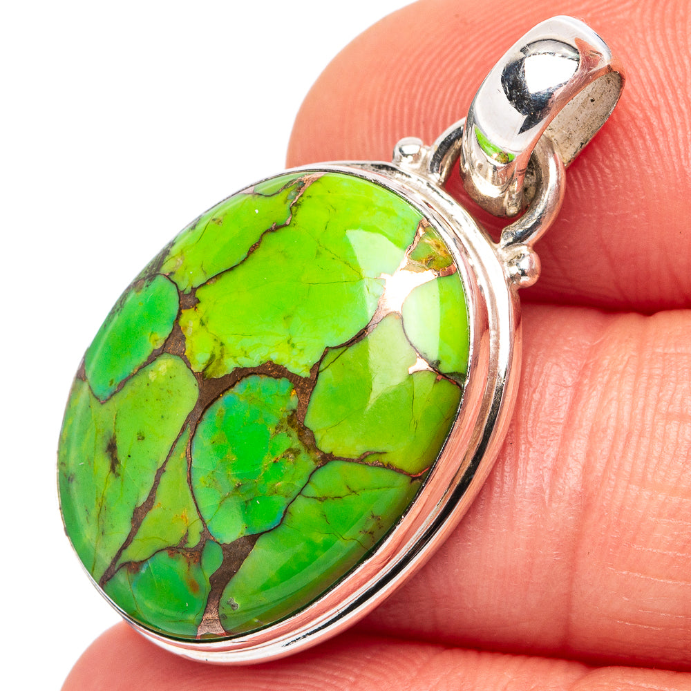 Oval green turquoise pendant in .925 sterling silver bezel with loop bail, close-up